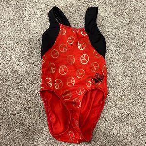 GK leotard Shawn Johnson CM red peace sign
